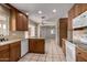 Eat-in kitchen features granite countertops and views to living space at 4249 E Mitchell Dr, Phoenix, AZ 85018
