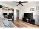 Comfortable bedroom with a ceiling fan, a view of a tv, and a closet with shelves for optimal organization at 4945 E Shapinsay Dr, San Tan Valley, AZ 85140