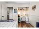 Bright bedroom with a study nook, wood floors, and a view of the backyard at 4945 E Shapinsay Dr, San Tan Valley, AZ 85140