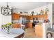 Bright kitchen with stainless steel appliances, tile floors, wood cabinets, and a breakfast nook at 4945 E Shapinsay Dr, San Tan Valley, AZ 85140