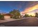 Charming single-Gathering home with a brick facade, well-maintained landscaping, and a basketball hoop above the garage at 4945 E Shapinsay Dr, San Tan Valley, AZ 85140