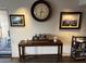 Dining room features a wooden table with decor, with artwork and furniture on display at 5110 N 31St Way # 345, Phoenix, AZ 85016