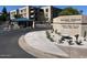 Gated entrance to Biltmore Terrace Condominiums with manicured landscaping and a monument sign at 5110 N 31St Way # 345, Phoenix, AZ 85016