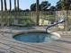Outdoor hot tub surrounded by lounge chairs offers a place for relaxation at 5110 N 31St Way # 345, Phoenix, AZ 85016