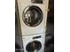 Efficient laundry room with stacked washer and dryer units at 5110 N 31St Way # 345, Phoenix, AZ 85016