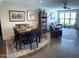 Open-concept living room and dining area with stylish furnishings and natural light at 5110 N 31St Way # 345, Phoenix, AZ 85016
