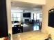 View of a dining and living room area featuring a fireplace and outdoor patio at 5110 N 31St Way # 345, Phoenix, AZ 85016