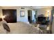 Comfortable main bedroom featuring nice furniture and decor with a Hassa Golf chair at 5110 N 31St Way # 345, Phoenix, AZ 85016