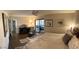 Comfortable main bedroom featuring nice furniture and decor with an exit to a patio at 5110 N 31St Way # 345, Phoenix, AZ 85016