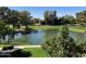 Scenic water view overlooking lush green landscape and mature trees creates a serene ambiance at 5110 N 31St Way # 345, Phoenix, AZ 85016