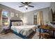 Bedroom with plush carpeting, neutral walls, and ample natural light at 5431 W Cochise Dr, Glendale, AZ 85302