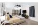 Spacious bedroom featuring a comfortable bed, and ceiling fan at 5431 W Cochise Dr, Glendale, AZ 85302