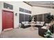 Inviting courtyard with brick pavers, comfortable seating, and a charming water fountain feature at 5431 W Cochise Dr, Glendale, AZ 85302