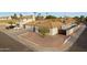 Well-maintained single-Gathering home featuring a tile roof, desert landscaping, and a two-car garage at 5431 W Cochise Dr, Glendale, AZ 85302