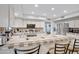 Open-concept kitchen with breakfast bar and stainless steel appliances for modern living at 5431 W Cochise Dr, Glendale, AZ 85302