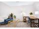 Inviting living space featuring a comfortable sofa and work from home desk at 5431 W Cochise Dr, Glendale, AZ 85302