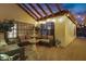 A cozy outdoor patio with a fountain, comfortable seating, and string lights, ideal for relaxation at 5431 W Cochise Dr, Glendale, AZ 85302