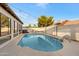 Refreshing backyard pool with clear blue water, perfect for hot summer days, and spa at 5431 W Cochise Dr, Glendale, AZ 85302