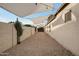 Spacious side yard featuring desert landscaping, rock ground cover, and mature shrubbery at 5431 W Cochise Dr, Glendale, AZ 85302