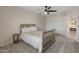 This bedroom boasts natural light, carpet, and an open closet at 5917 N 133Rd Ave, Litchfield Park, AZ 85340