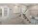 This hallway features carpet, staircase, and modern design at 5917 N 133Rd Ave, Litchfield Park, AZ 85340