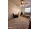 Cozy room featuring neutral carpet, ceiling fan and comfortable couch at 650 N Hawes Rd # 4609, Mesa, AZ 85207
