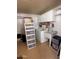 Laundry room with sink, white washer and dryer, and plenty of storage space at 650 N Hawes Rd # 4609, Mesa, AZ 85207