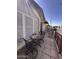 Outdoor patio with metal railing, seating, and an awning overhead at 650 N Hawes Rd # 4609, Mesa, AZ 85207