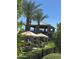 Charming pool cabanas for shade and relaxation at the community center by the pool at 650 N Hawes Rd # 4609, Mesa, AZ 85207