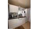 Room with ample counter space, storage cabinets, and small window at 650 N Hawes Rd # 4609, Mesa, AZ 85207