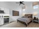Bedroom featuring wood ceiling detail, bedside tables, and a wine fridge at 6790 S Springs Pl, Chandler, AZ 85249