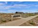 Inviting community entrance with shaded picnic area, lush landscaping, and well maintained walking paths at 6790 S Springs Pl, Chandler, AZ 85249