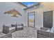 Welcoming courtyard with comfortable seating, a decorative tree and pavers at 6790 S Springs Pl, Chandler, AZ 85249