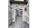 Covered entryway featuring stone walls and decorative pavers at 6790 S Springs Pl, Chandler, AZ 85249