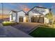 Beautiful single-Gathering home with well-manicured landscaping and brick-paved driveway at 6790 S Springs Pl, Chandler, AZ 85249