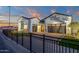 Single-Gathering home with meticulously landscaped front yard and custom brick-paved driveway and sidewalk at 6790 S Springs Pl, Chandler, AZ 85249
