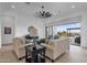 Bright living room with an open floor plan, comfortable seating, and a large sliding door to the outdoor patio at 6790 S Springs Pl, Chandler, AZ 85249