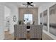 Stylish office featuring wood floors, brick accent wall, shiplap walls, and modern decor at 6790 S Springs Pl, Chandler, AZ 85249