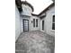 Private courtyard featuring stone accents, stucco walls, and decorative pavers at 6790 S Springs Pl, Chandler, AZ 85249