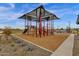 Community playground featuring modern equipment and shaded areas, providing a safe and fun environment for children to play at 6790 S Springs Pl, Chandler, AZ 85249