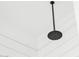 Close up of matte black shower head fixture in bathroom at 6790 S Springs Pl, Chandler, AZ 85249