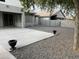 Spacious backyard patio and desert landscaping, perfect for outdoor enjoyment and low maintenance at 7163 W Lamar Rd, Glendale, AZ 85303