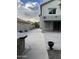 Spacious backyard with a patio area and exterior fireplace at 7163 W Lamar Rd, Glendale, AZ 85303