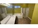 Bright bathroom with a dual sink vanity, separate shower, and bathtub at 7511 S 45Th Dr, Laveen, AZ 85339