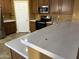 Close-up of a modern kitchen with stainless steel appliances and a sleek countertop at 7511 S 45Th Dr, Laveen, AZ 85339