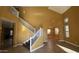 Inviting living room with a staircase, high ceilings, and abundant natural light for a bright, airy space at 7511 S 45Th Dr, Laveen, AZ 85339