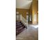 A living room features stairs, tile floors, and large windows at 7511 S 45Th Dr, Laveen, AZ 85339