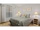 Cozy bedroom with a window, carpeted floors, and a calming color scheme with a comfortable setting for restful nights at 76 W Stacey Ln, Tempe, AZ 85284