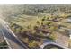 Aerial view of the expansive community park with playgrounds, sports fields, and lush greenery at 76 W Stacey Ln, Tempe, AZ 85284