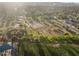 Aerial shot of a community park featuring tennis courts and a playground at 76 W Stacey Ln, Tempe, AZ 85284